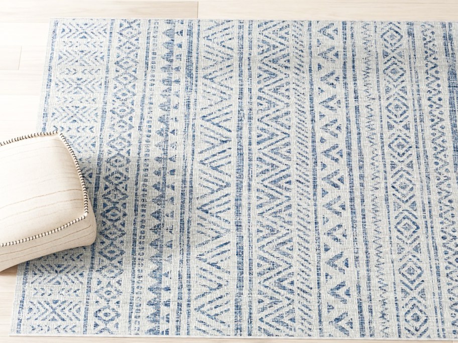 blue and white geometric print rug