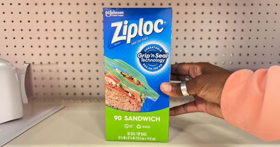 hand holding Ziploc Sandwich Bags 90-Count on store shelf