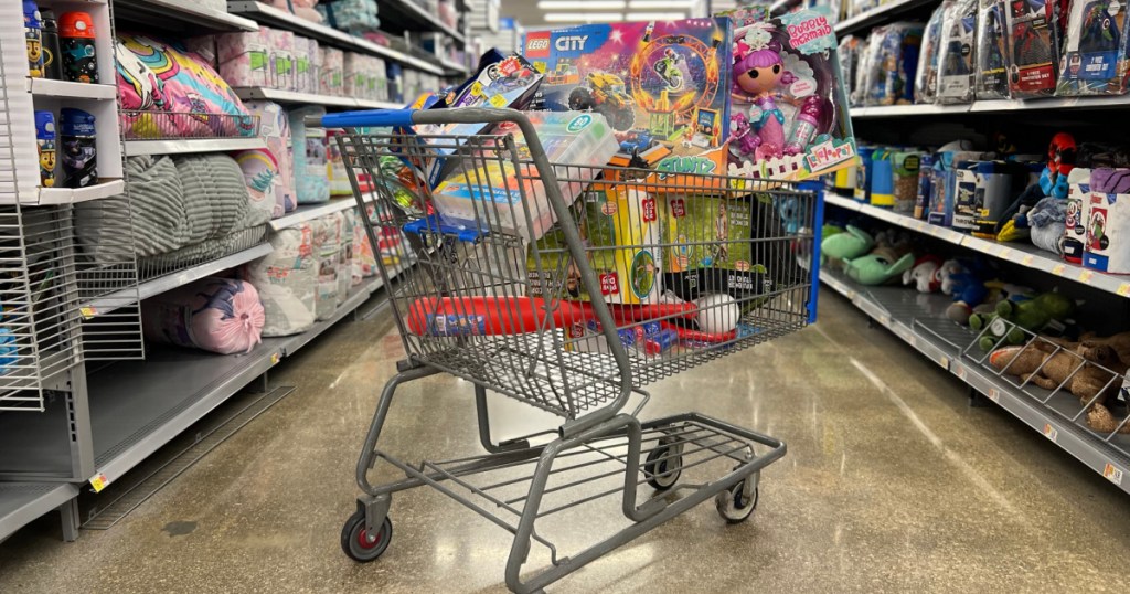 walmart cart filled with toys in store aisle
