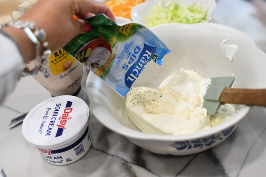 adding ranch seasoning to cream cheese