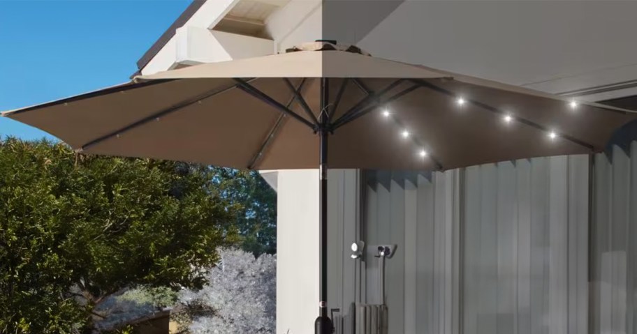 tan umbrella with lights 