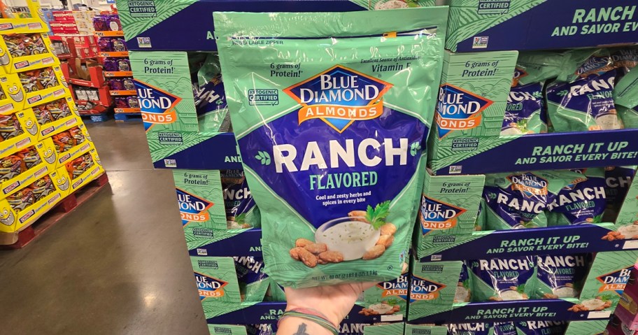 hand holding bag of blue diamond ranch almonds