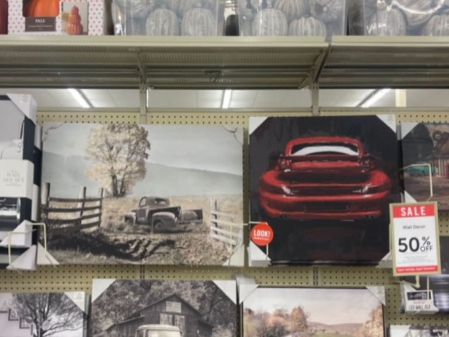 classic car wall decor hanging in store