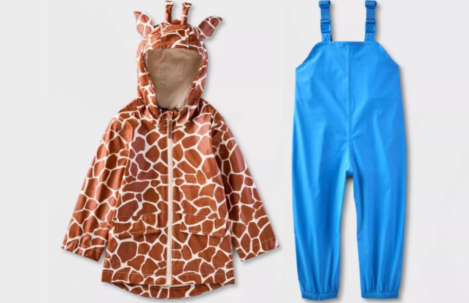 a toddler giraffe raincoat and a toddler rain bib in blue