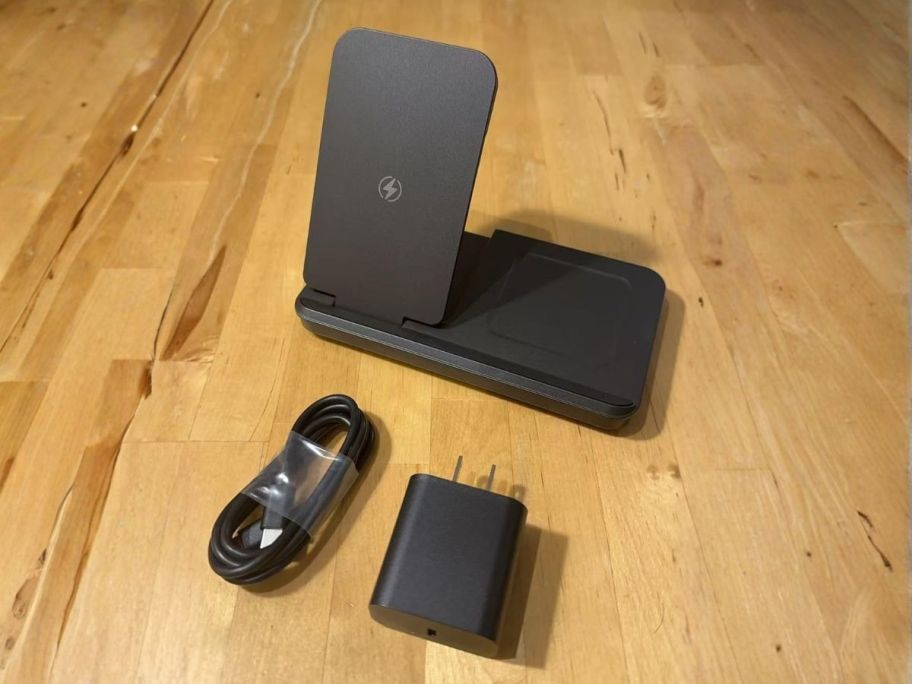 Apple devices charging station on table
