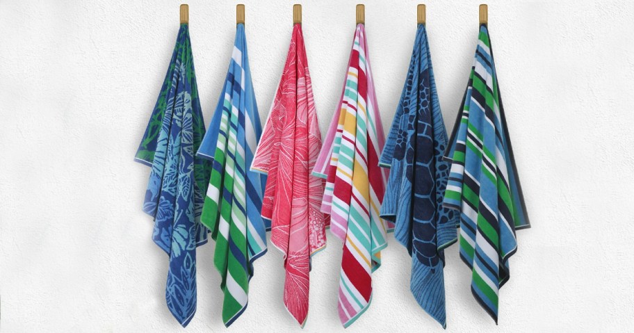 beach towels hanging on wall 