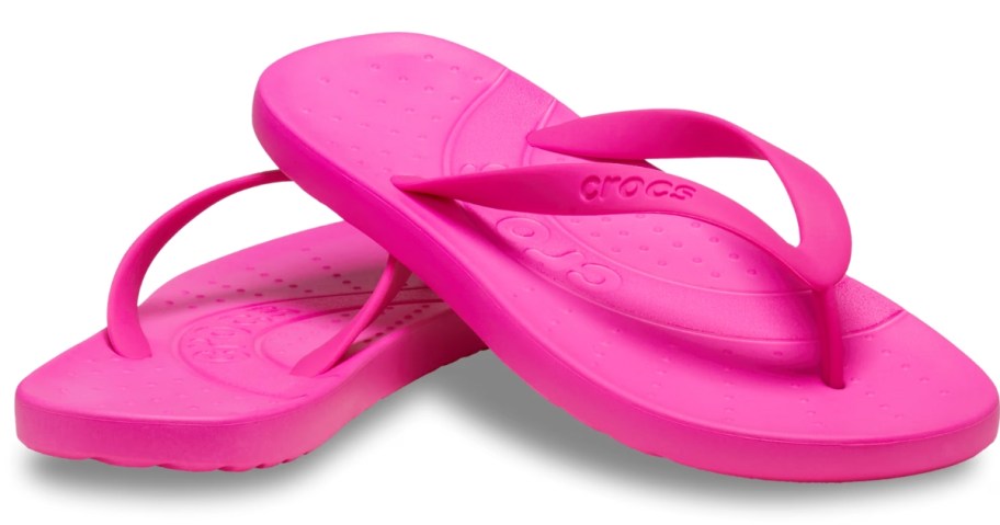 pair of pink crocs flip flops