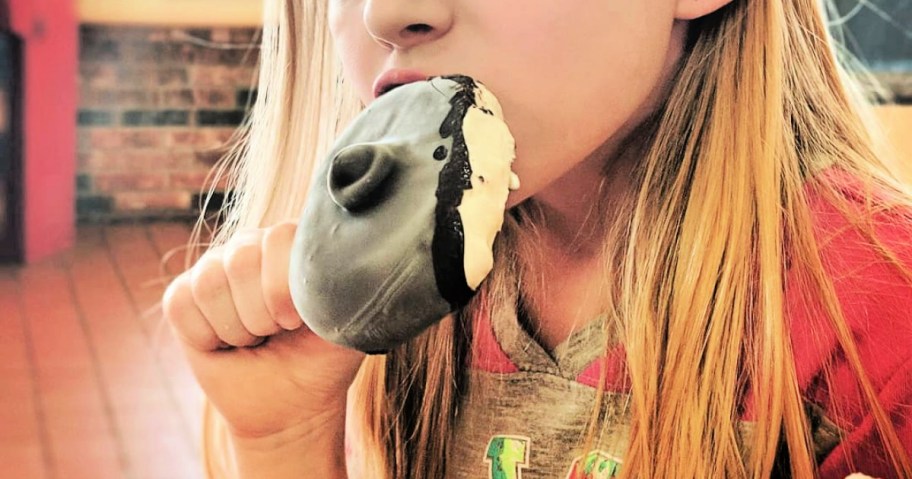 girl eating a dairy queen dilly bar
