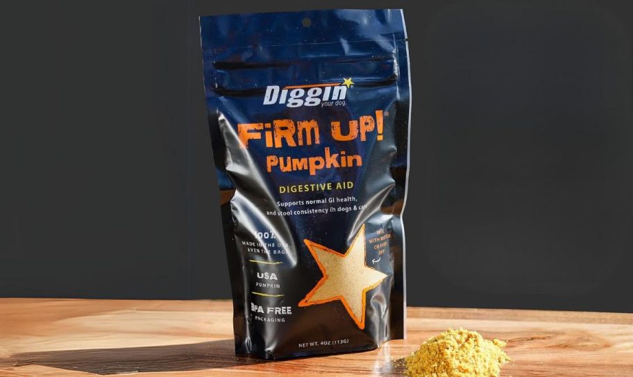 a 1oz bag of pumpkin flavored pet digestive supplement on a wooden counter