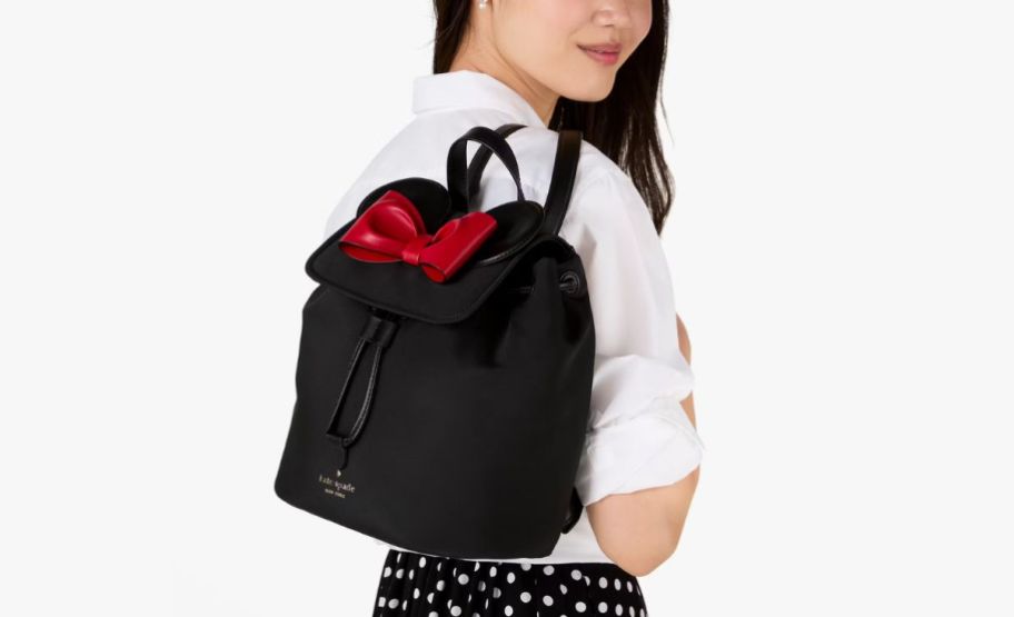 Woman with black mini mouse backpack