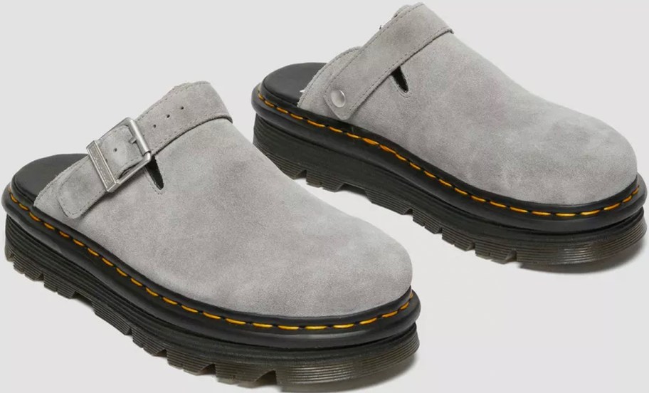 pair of gray dr marten mules 