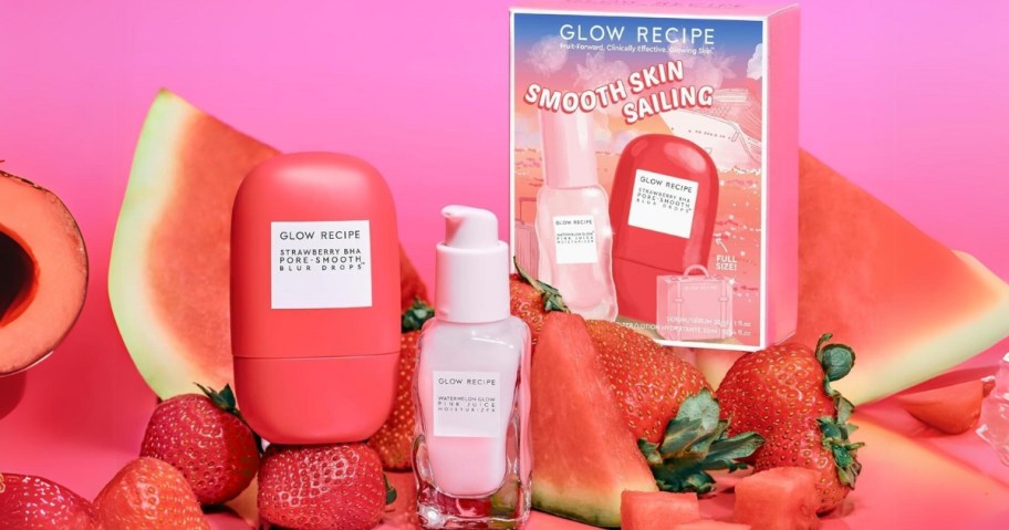 Glow Recipe skincare products and box the set comes in surrounded by watermelon and fruit slices