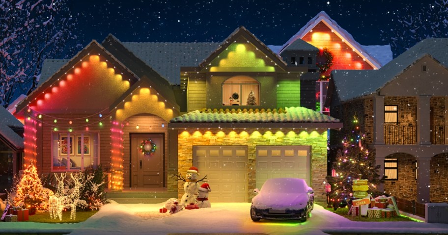 outside of a house with Christmas decor and colorful accent lighting around roof lines