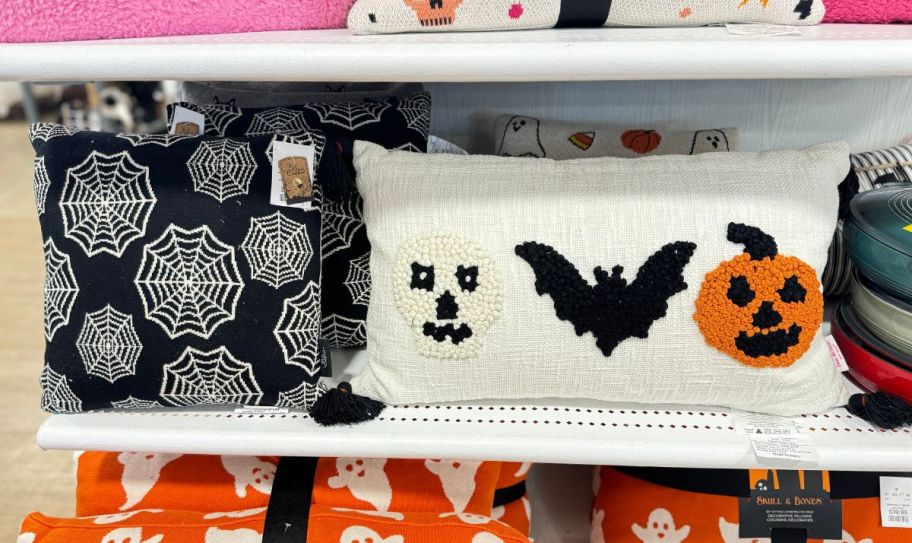 Halloween decorative pillows on a store shelf