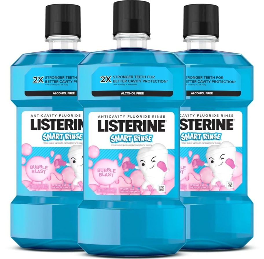 Three bottles of Listerine kids mouthwash on a white background