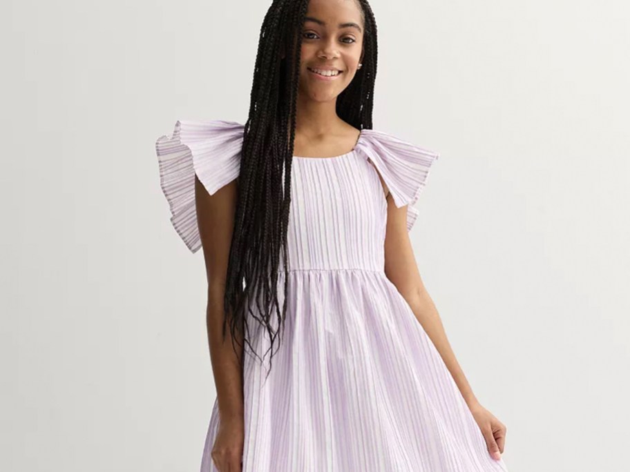 girl wearing purple dress