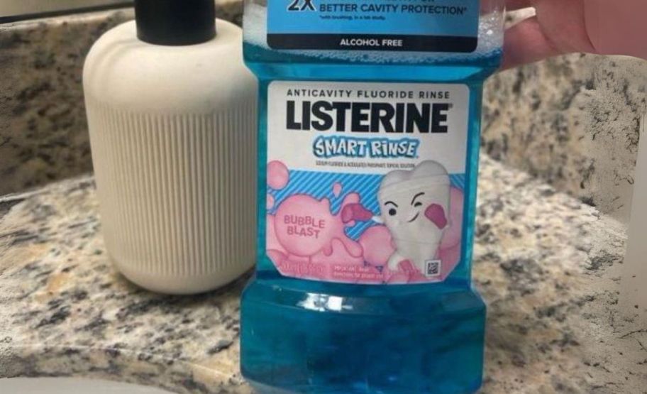 a bottle of kids Listerine mouthwash on a bathroom counter