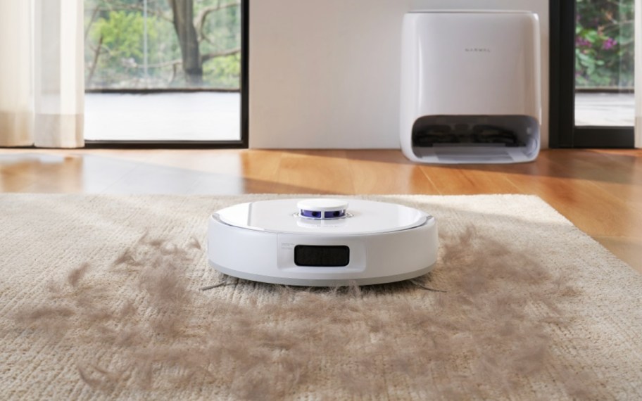 robot vacuum on floor with pet hair