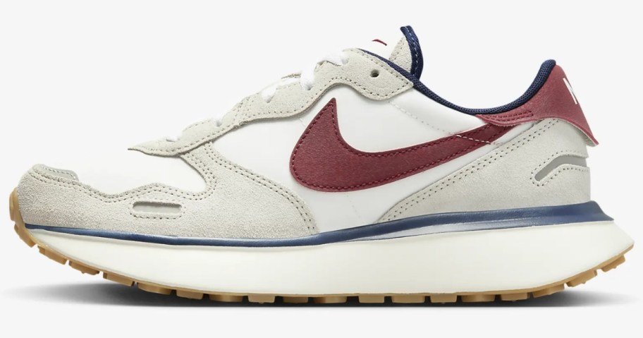 white, off white, red and blue women's Nike shoe