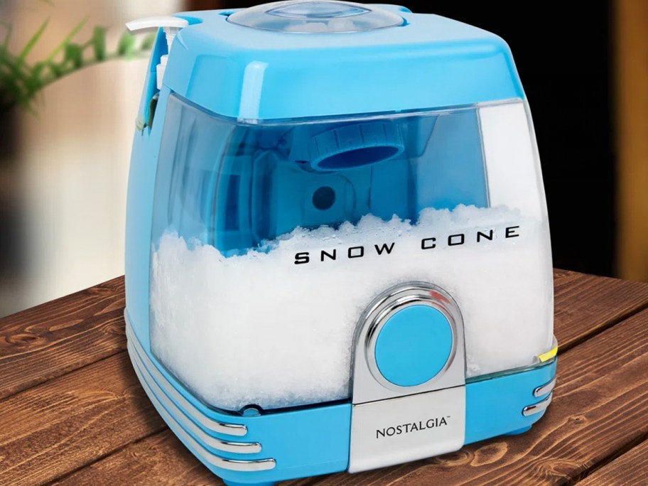 blue snow cone maker on table