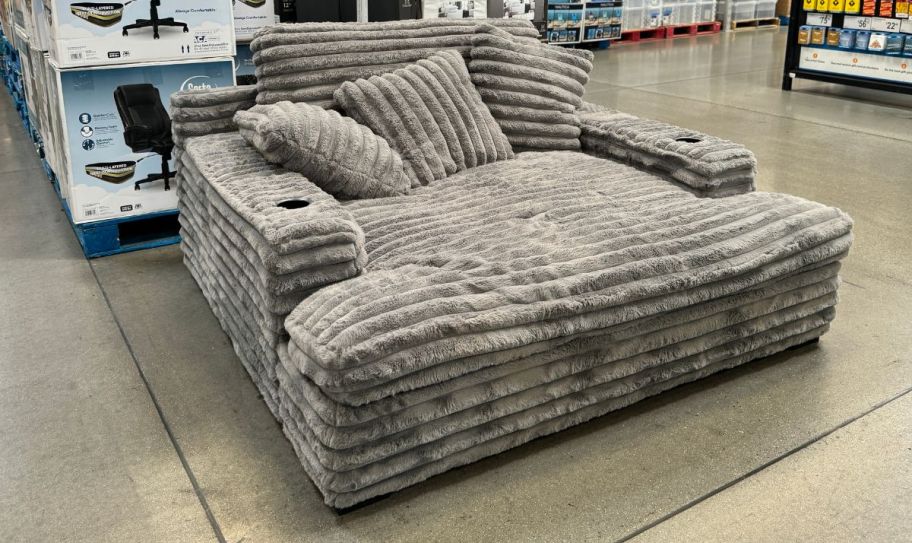 an oversized gray chair in a sams club