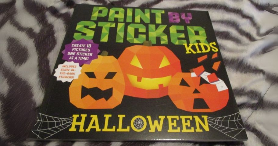 paint by sticker halloween book on blanket