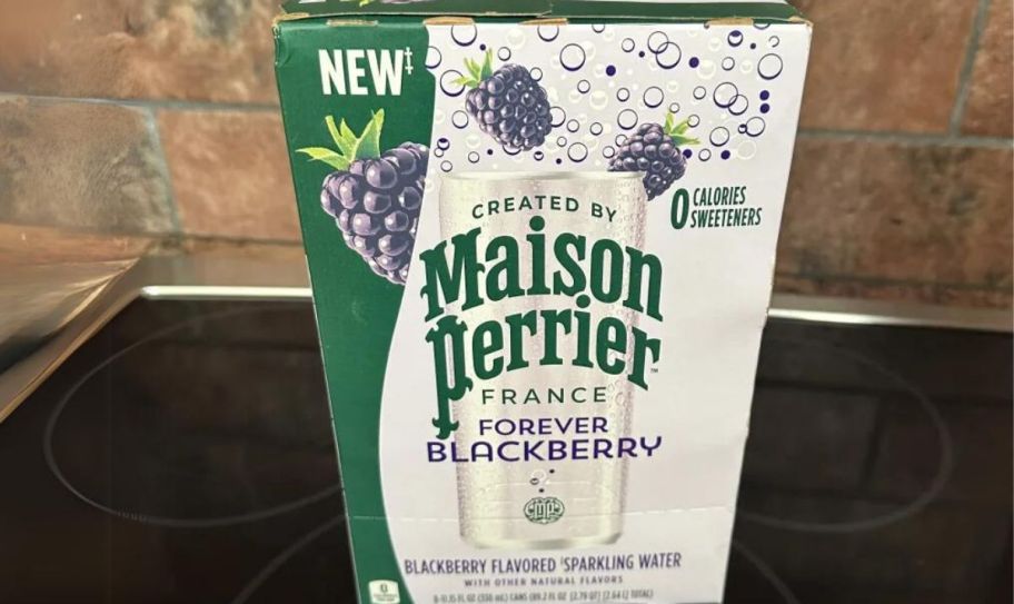 an 8-pack of perrier blackberry flavored sparkling water