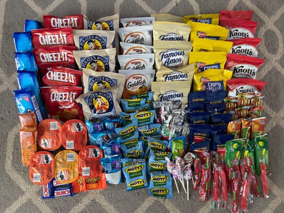 Various kinds of snacks on carpet 