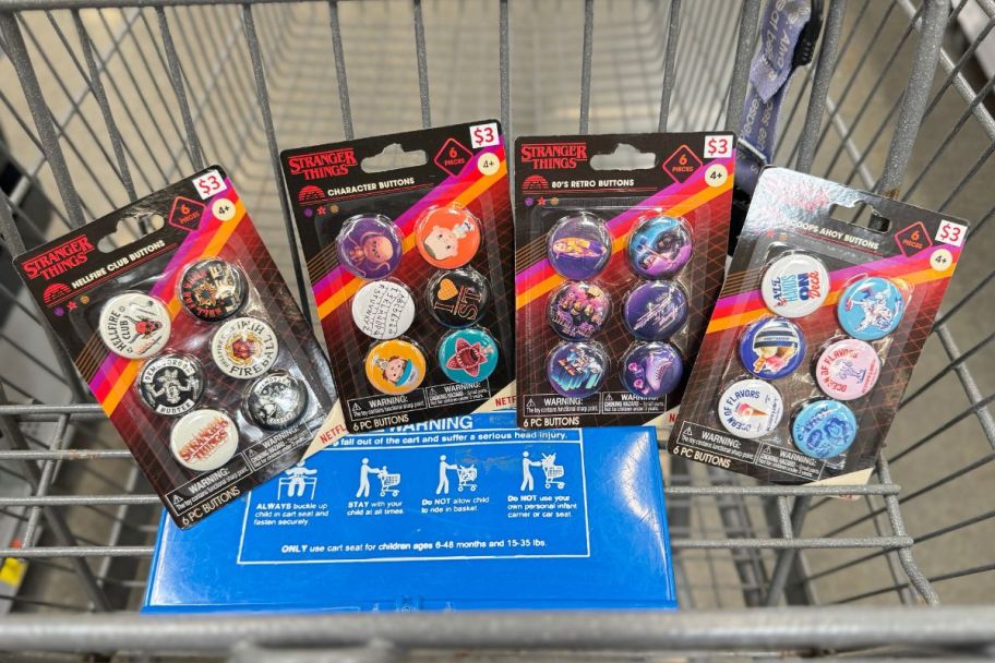 4 sets of stranger things buttons in a shopping cart