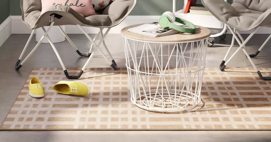 tan checkered rug in room 