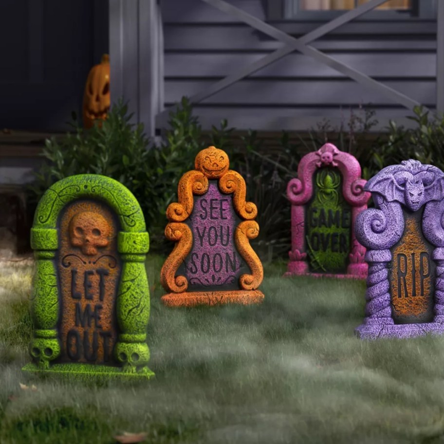 set of 4 black and neon tombstone Halloween yard decorations