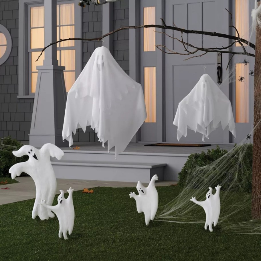 yard with ghost Halloween decor