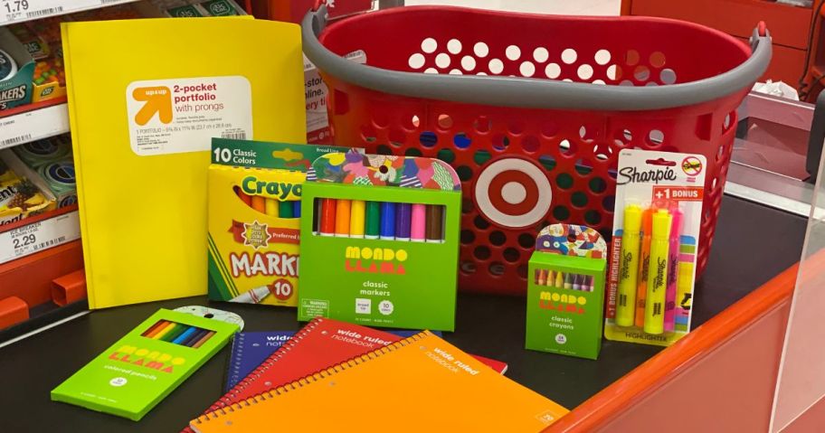 target school supplies at checkout with basket on belt