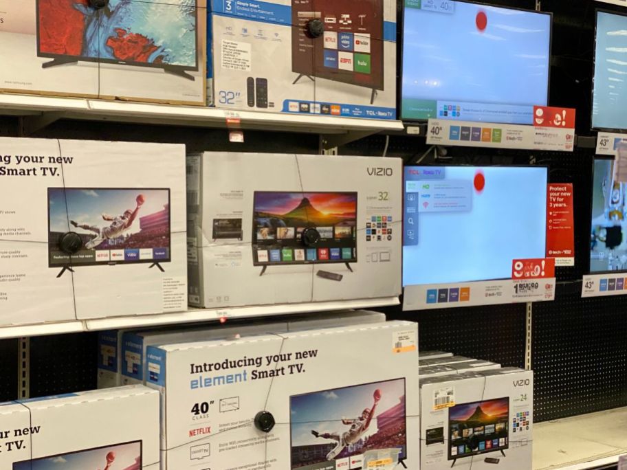 tv boxes on shelves in store