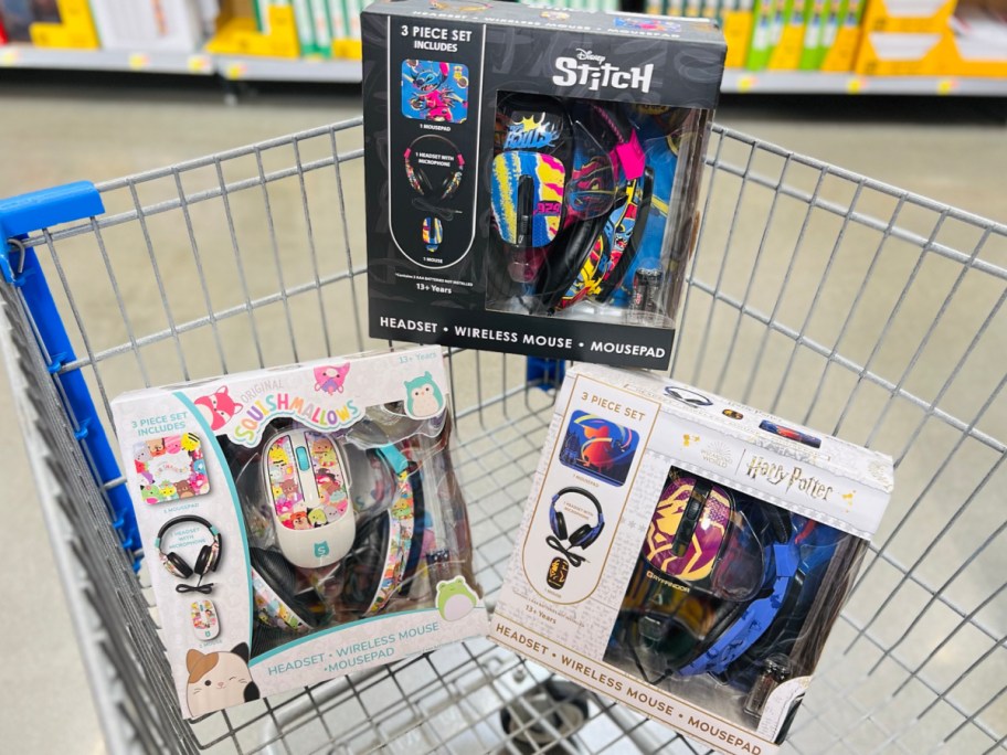 three 3 piece headsets with designs inside of walmart shopping cart