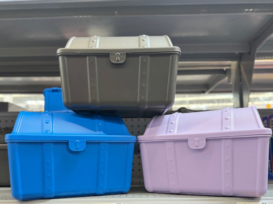 treasure boxes in blue, black and purple