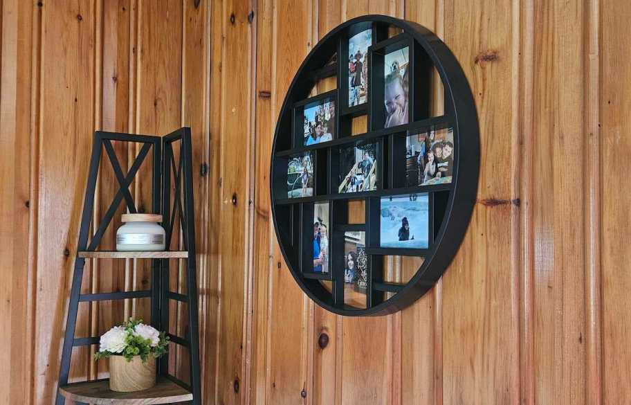 circle picture frame on wood panel wall