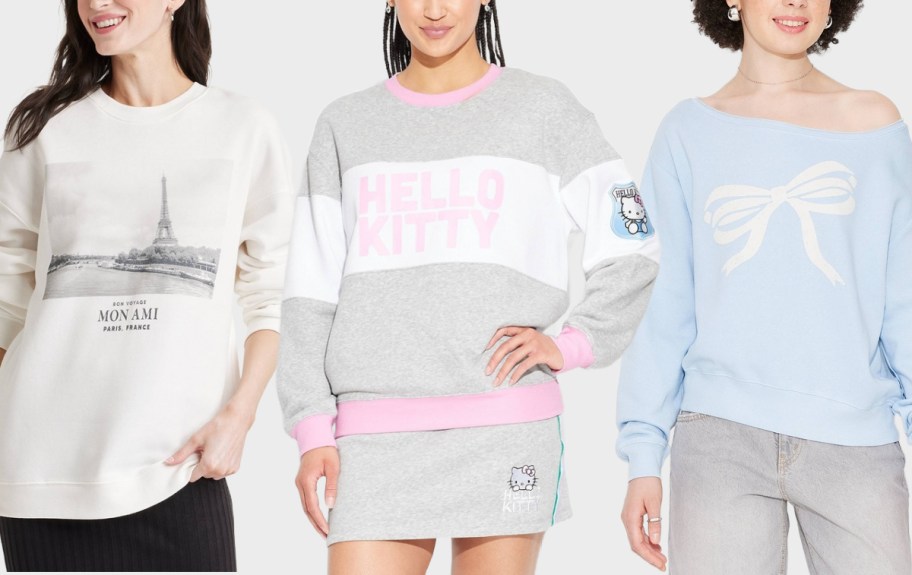 women wearing threee graphic sweaters from Target