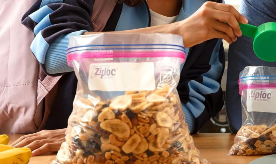 a gallon ziploc freezer bag filled with trail mix on a table top