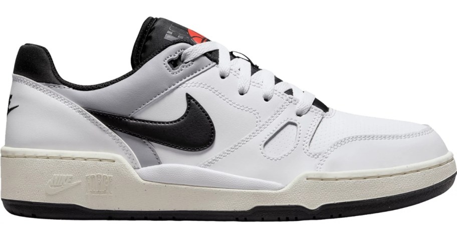 white, black and grey men's Nike shoe