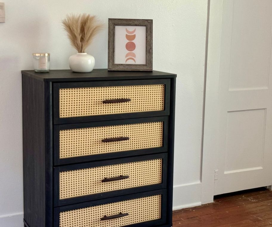 a black caning 4 drawer dresser