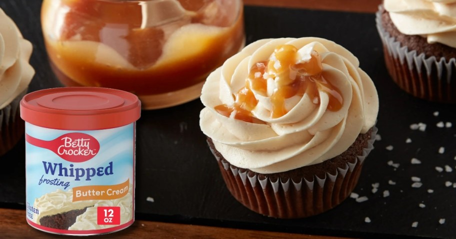 Betty Crocker Whipped Butter Cream Frosting can with a cupcake.