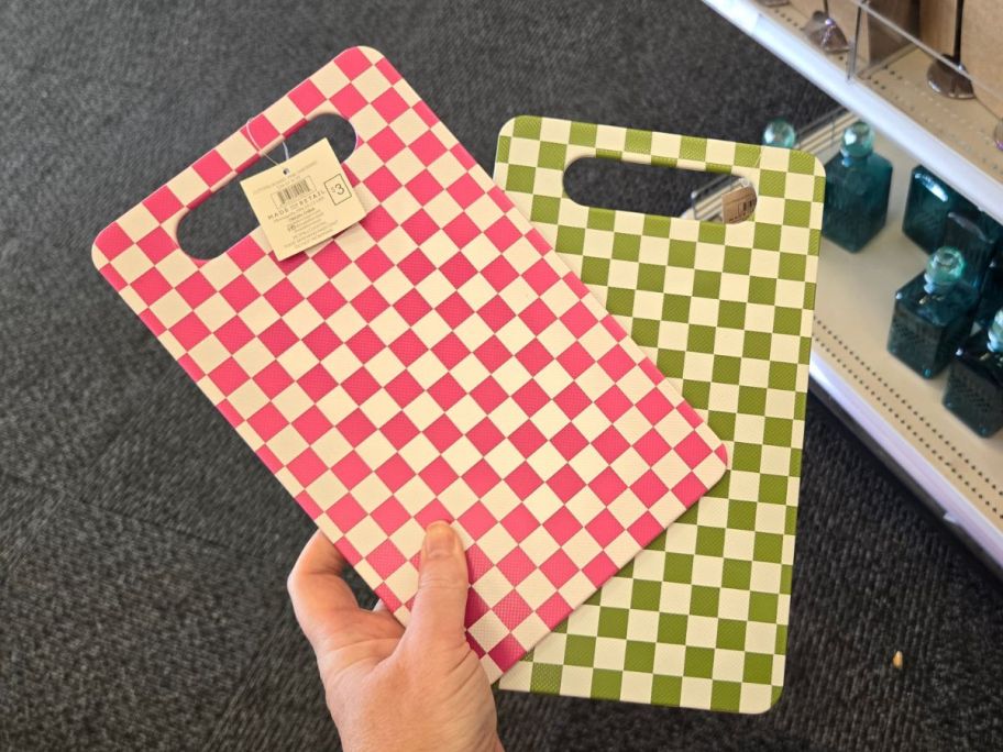 Checkered Cutting Boards in hand in store