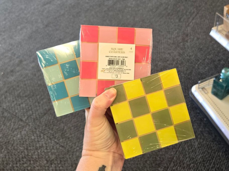 Checkered Square Coasters in hand in store