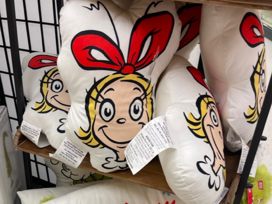 Cindy Lou throw pillow displayed on the stand