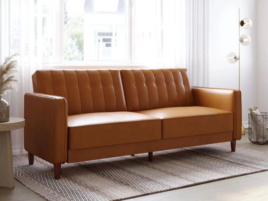 A Futon in Camel Faux Leather