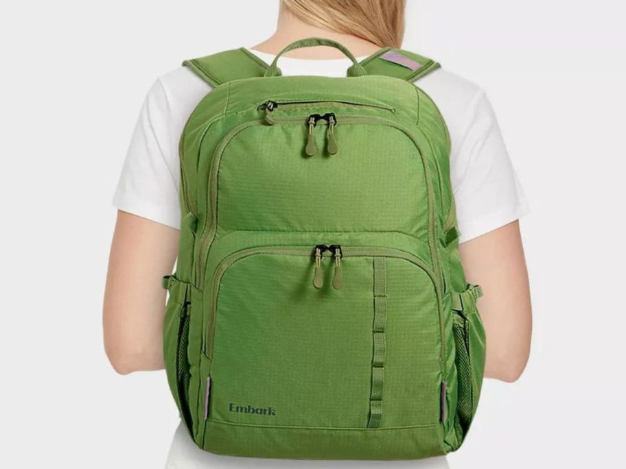 woman wearing Embark Top-Load 17" Backpack