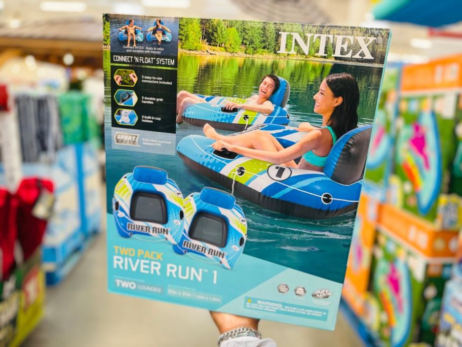 A person holding a Intex River Run 2-Pack