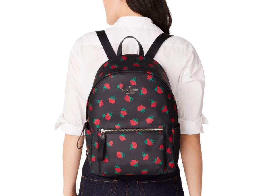 Girl wearing Kate Spade Chelsea Large Backpack