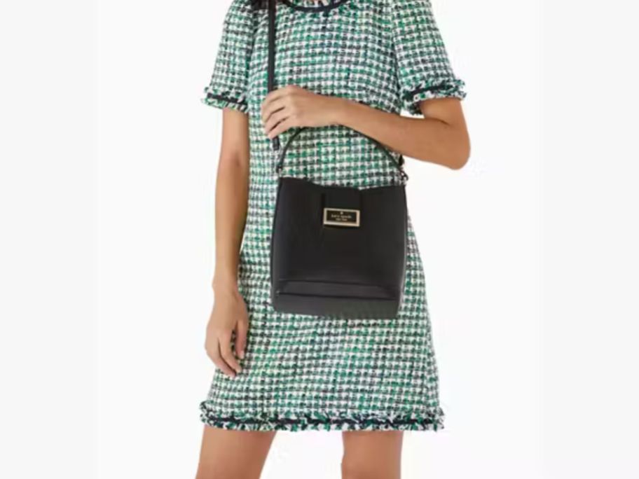 Girl wearing Kate Spade Regan Bucket Bag